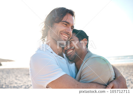 Love, hug and gay couple on beach, smile and laugh on summer vacation together in Thailand. Sunshine, ocean and island, happy lgbt men embrace in nature for on fun holiday with pride, sea and sand. Love, hug and gay couple on beach, smile and laugh on summer vacation together in Thailand. Sunshine, ocean and island, happy lgbt men embrace in nature for on fun holiday with pride, sea and sand. 105712711