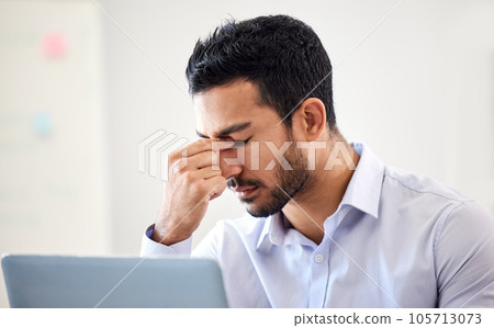 Stressed, frustrated and depressed business man suffering from a headache or migraine and struggling to meet a deadline. Overworked, irritated and annoyed male worker experiencing problems and worry Stressed, frustrated and depressed business man suffering from a headache or migraine and struggling to meet a deadline. Overworked, irritated and annoyed male worker experiencing problems and worry 105713073