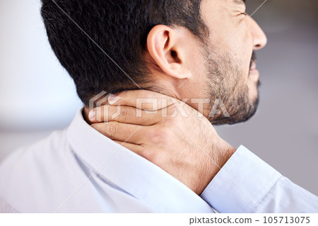 Stress, pain and sore neck closeup of businessman massaging strained muscle. Stressed corporate man suffering from a painful injury rubbing back. Feeling fatigue and unhappy with bad posture 105713075
