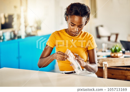 Test for covid, corona virus or infection with a rapid antigen test kit at home. Young and casual woman unpacking a screening kit to diagnose an illness, sickness or infectious viral disease Test for covid, corona virus or infection with a rapid antigen test kit at home. Young and casual woman unpacking a screening kit to diagnose an illness, sickness or infectious viral disease 105713169