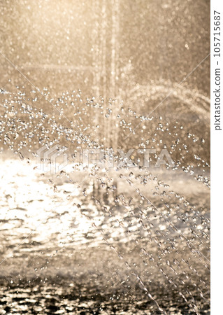Beautiful background of water in the rays of the setting sun. Beautiful background of water in the rays of the setting sun. 105715687