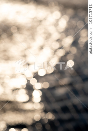 Beautiful background of water in the rays of the setting sun. Beautiful background of water in the rays of the setting sun. 105715718