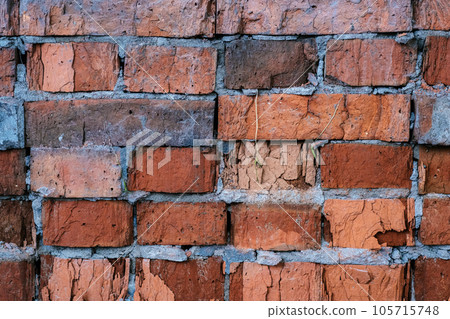 The texture of old brick wall in close-up. 105715748