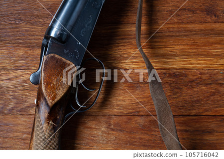 Hunting shotgun with brass cases and accessories for cartridge reloading. Hunting shotgun with brass cases and accessories for cartridge reloading. 105716042