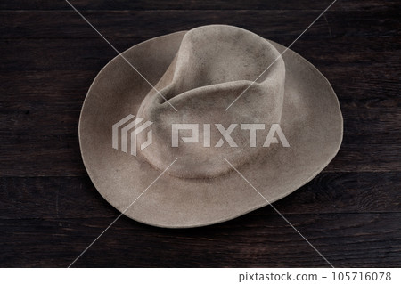 Old west hat on table. Top view. Old west hat on table. Top view. 105716078