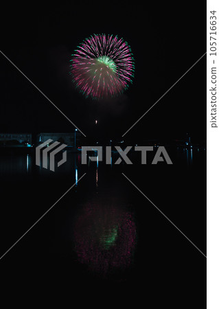 Fireworks and sea reflection Fireworks and sea reflection 105716634