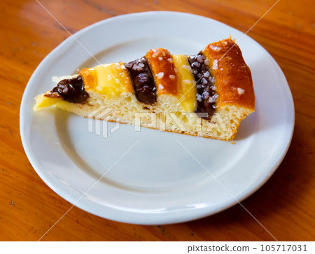Pie with custard and chocolate cream Pie with custard and chocolate cream 105717031