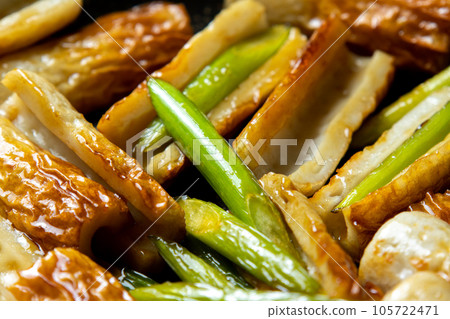 Stir-fried chikuwa and garlic sprouts (stir-fried with sauce), cooking scene. Stir-fried chikuwa and garlic sprouts (stir-fried with sauce), cooking scene. 105722471