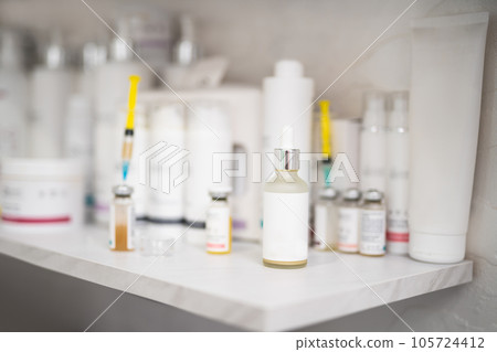 various cosmetics and creams of the professional brand on the storefront and in the cosmetology salon various cosmetics and creams of the professional brand on the storefront and in the cosmetology salon 105724412