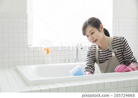 Bath cleaning young woman housewife housework 105724668