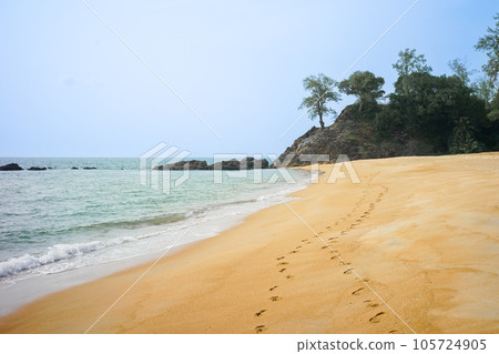 Footprint on the sand with a clear sky on the beach 105724905