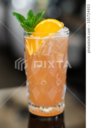 beautiful alcoholic cocktail on the bar counter 105724933