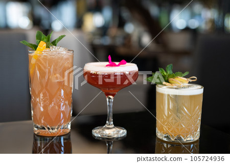 beautiful alcoholic cocktail on the bar counter 105724936