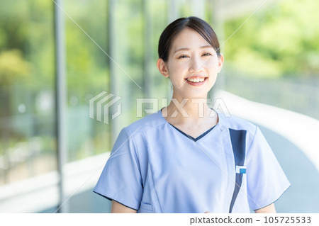 Smiling young female nurse 105725533