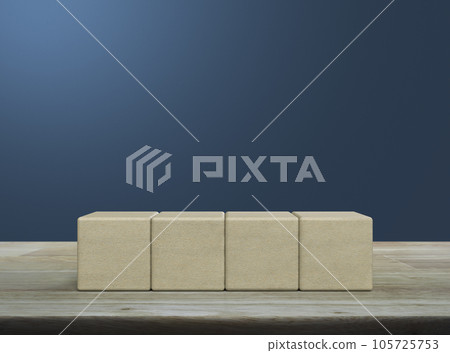 Four block cubes on wooden table 105725753
