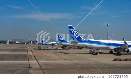 Airplane parked at international airport 105725795