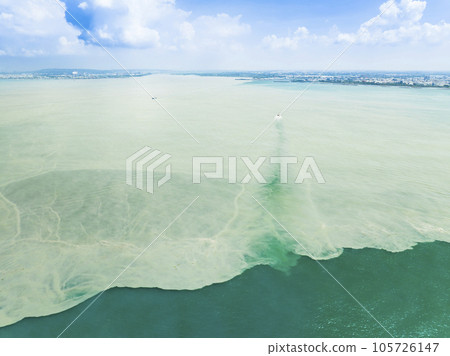 Aerial view dirty oily stain pollution coast sea Aerial view dirty oily stain pollution coast sea 105726147