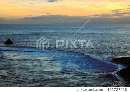 Sunset over the sea 105727428