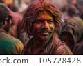 Smiling indian man in colorful powder celebrate Holi festival on people background. AI generative 105728428