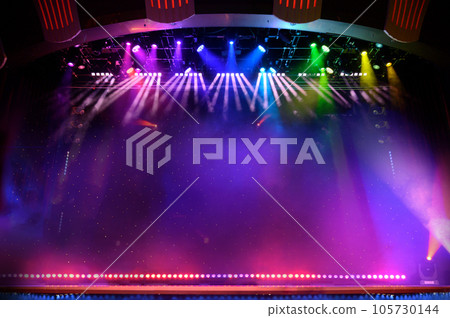 Elegant theater stage with colored lights and smoke Elegant theater stage with colored lights and smoke 105730144