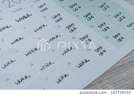 4 day work week printed calendar with weekend days four day working week concept. Modern approach doing business short workweek. Effectiveness of employees. Productivity and efficiency 105730593