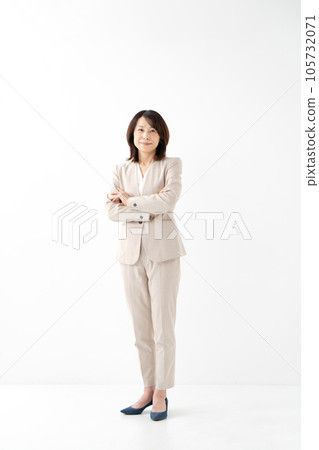 Female business arms folded Female business arms folded 105732071