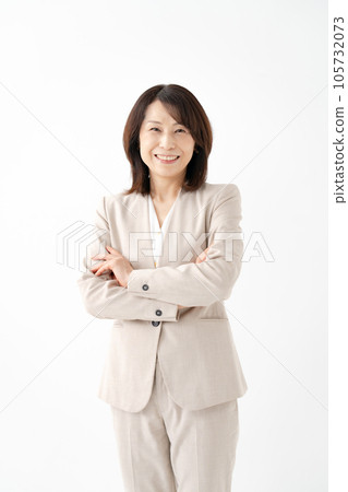 Female business arms folded Female business arms folded 105732073