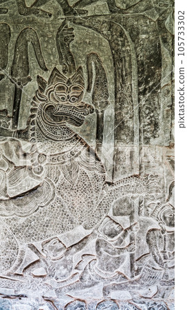 Wall carving of Khmer Culture in Ancient ruins Angkor Wat temple - famous Cambodian landmark. Siem Reap, Cambodia. 105733302
