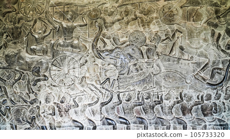 Wall carving of Khmer Culture in Ancient ruins Angkor Wat temple - famous Cambodian landmark. Siem Reap, Cambodia. 105733320