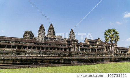 Ancient ruins Angkor Wat temple - famous Cambodian landmark. Siem Reap, Cambodia. Ancient ruins Angkor Wat temple - famous Cambodian landmark. Siem Reap, Cambodia. 105733331