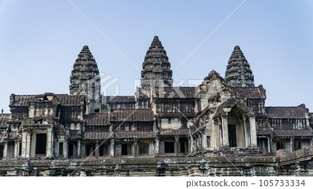 Ancient ruins Angkor Wat temple - famous Cambodian landmark. Siem Reap, Cambodia. Ancient ruins Angkor Wat temple - famous Cambodian landmark. Siem Reap, Cambodia. 105733334