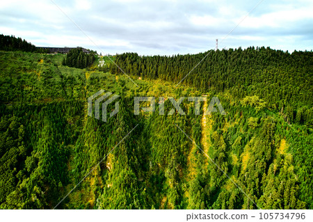 Green forest and abandoned hotel view. Sete Cidades, Azores Green forest and abandoned hotel view. Sete Cidades, Azores 105734796