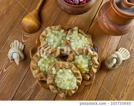 Karelian pasty with apples Karelian pasty with apples 105735693