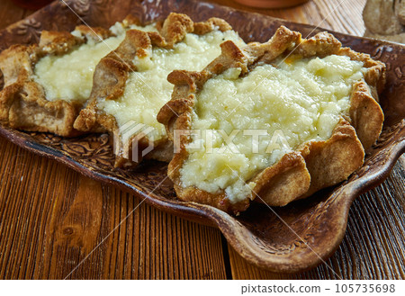 Karelian pasty with potatoes Karelian pasty with potatoes 105735698