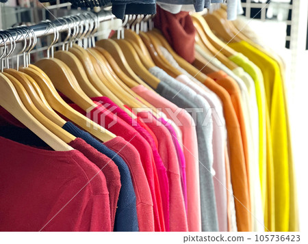 Cutsews displayed on hangers 105736423