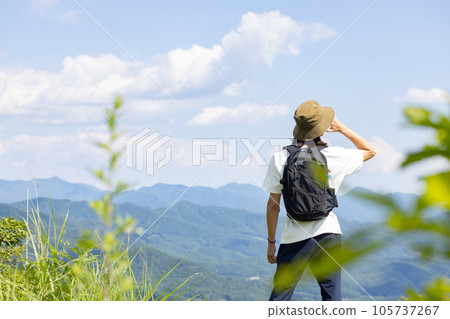 Man enjoying hiking Man enjoying hiking 105737267