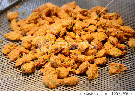 fried fish-paste balls at street food market in Bangkok, Thailand fried fish-paste balls at street food market in Bangkok, Thailand 105739506