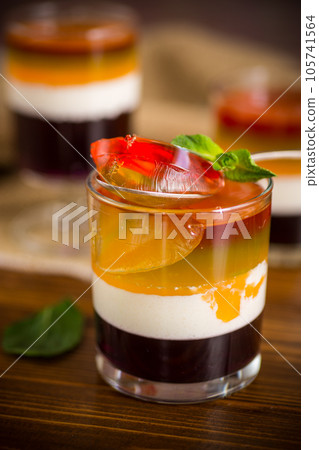lot of colored sweet fruit jelly in a glass lot of colored sweet fruit jelly in a glass 105741564