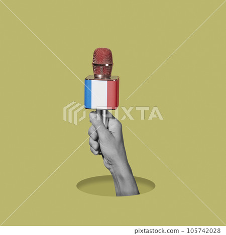 hand holding a french microphone hand holding a french microphone 105742028