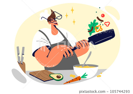 Man chef holds frying pan and prepares food, throws up ingredients to avoid burning during frying 105744293