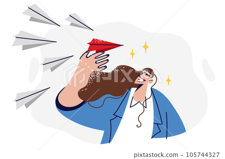 Business woman holds flying airplane symbolizing team leadership and ability to manage employees Business woman holds flying airplane symbolizing team leadership and ability to manage employees 105744327