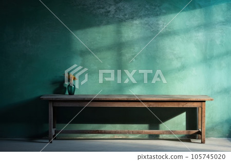 Rustic wooden table with a blue wall 105745020