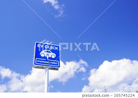 Road facility EV quick charging spot sign copy space Road facility EV quick charging spot sign copy space 105745224