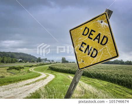 dead end sign on a dirt farm road in Nebraska 105746674