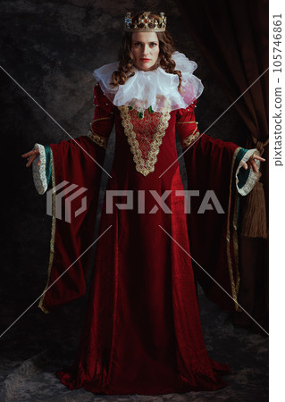 Full length portrait of medieval queen in red dress Full length portrait of medieval queen in red dress 105746861