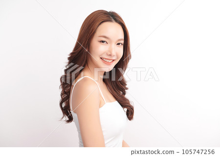 Beautiful young asian woman with clean fresh skin on white background, Face care, Facial treatment, Cosmetology, beauty and spa, Asian women portrait. Beautiful young asian woman with clean fresh skin on white background, Face care, Facial treatment, Cosmetology, beauty and spa, Asian women portrait. 105747256