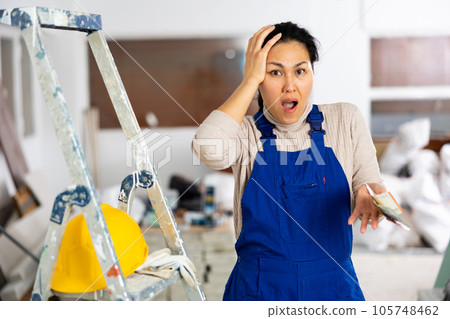 Female builder is unhappy with the money received for work done 105748462