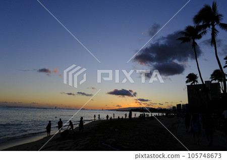 People watching sunsets 105748673