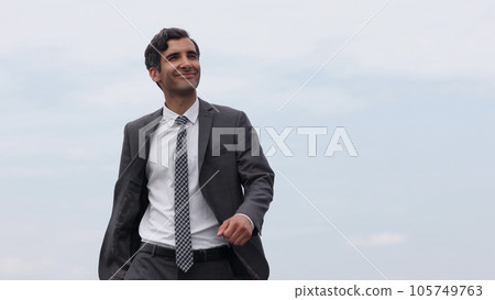 Business caucasian man isolated on white background having doubts while raising hands 105749763