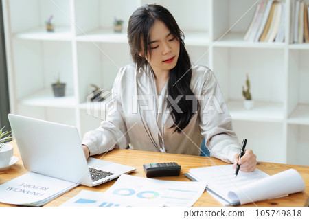 Professional Accountant Woman In Office Doing Accounting And Budget Professional Accountant Woman In Office Doing Accounting And Budget 105749818